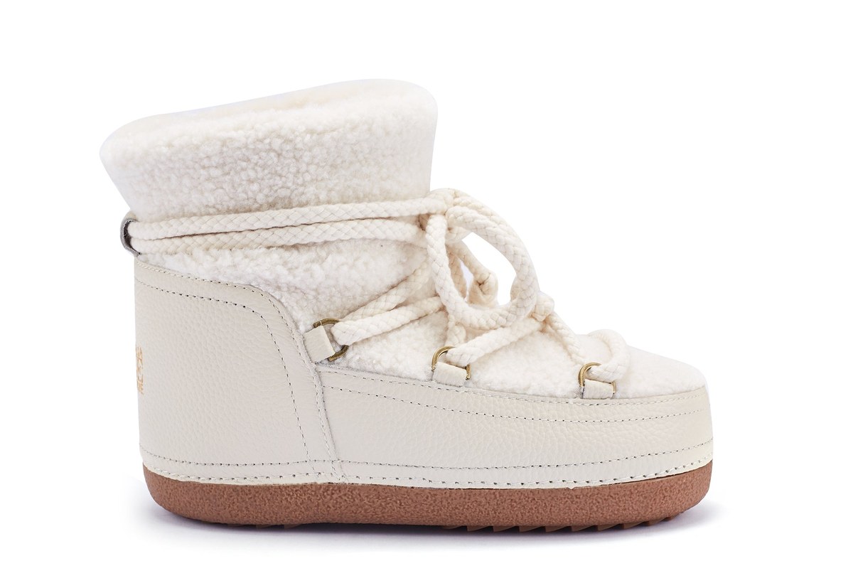 Cream textured winter boot styled for a soft neutral wardrobe